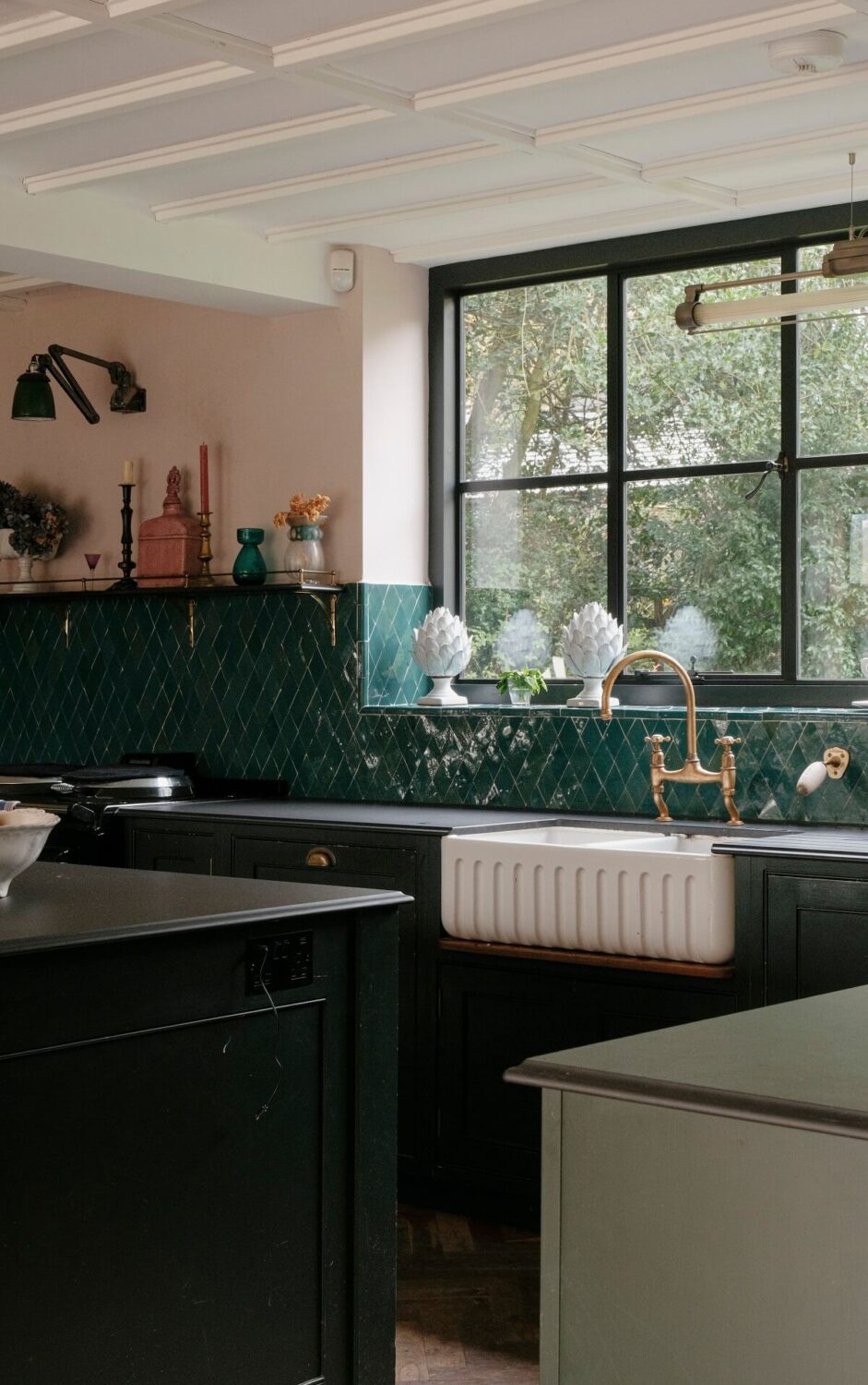 ribbed kitchen sink and glossy green tiles