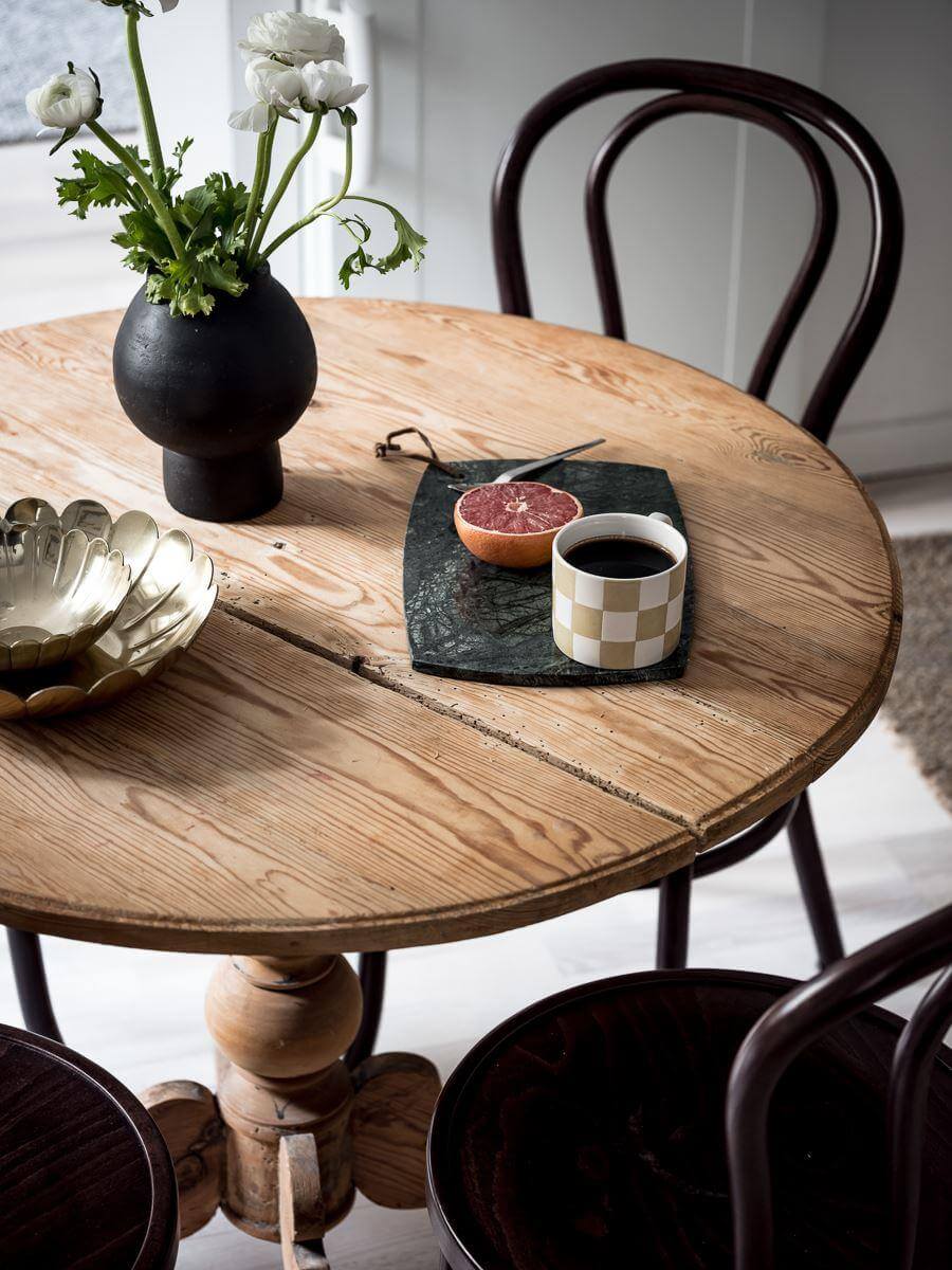 round wooden dining table