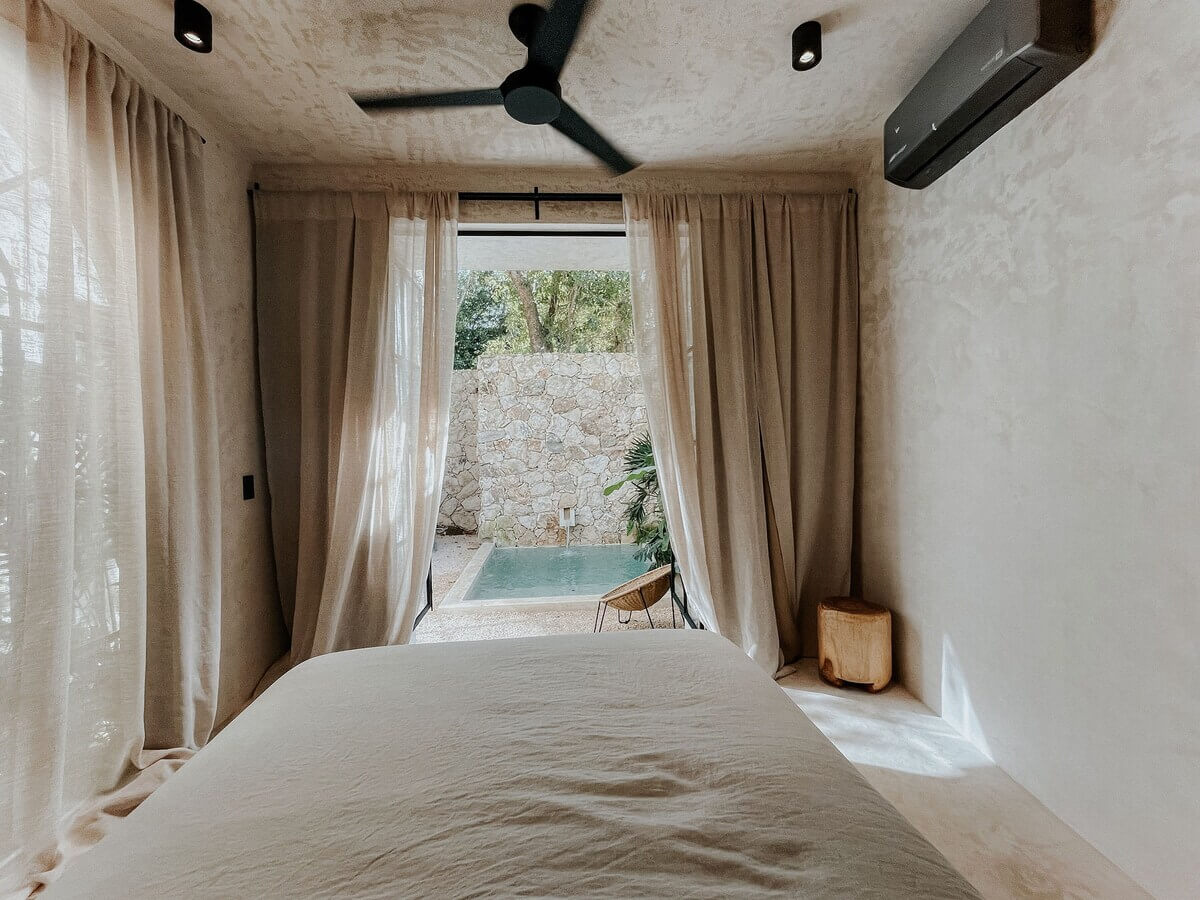 serene-bedroom-view-to-swimming-pool-tulum-airbnb-nordroom