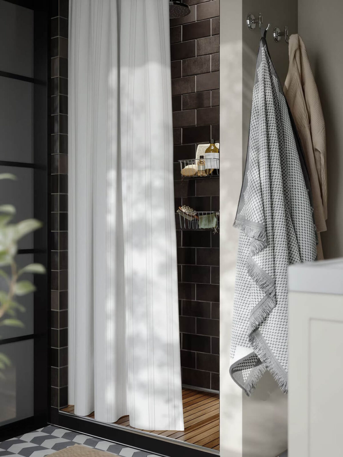 shower with black tiles nordroom