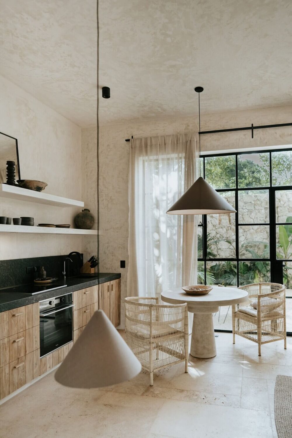 small-wooden-kitchen-shelves-round-dining-table-wicker-chairs-nordroom