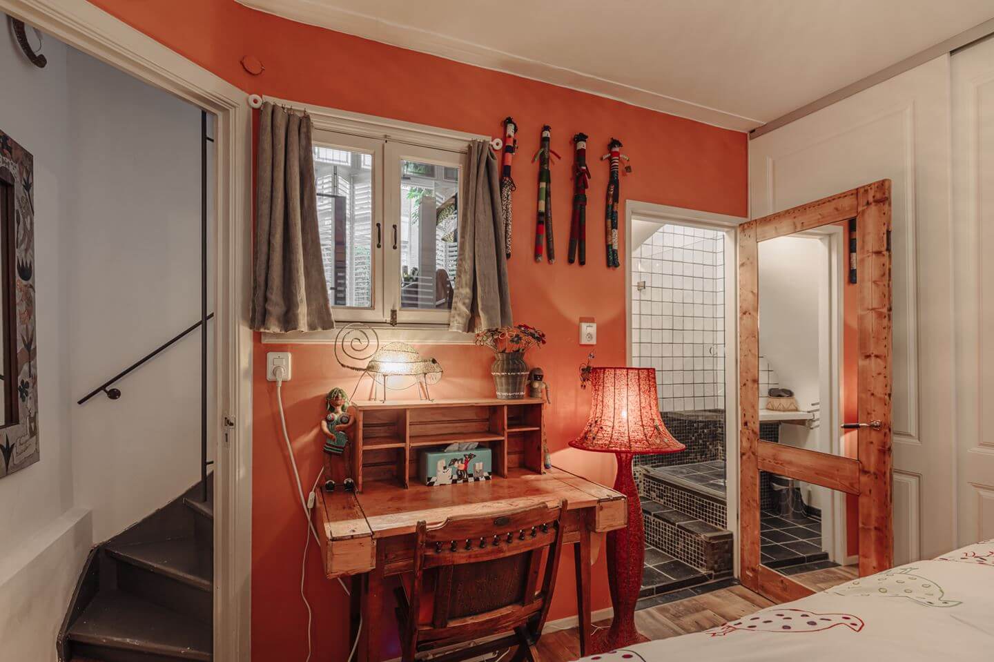 terracotta bedroom with desk