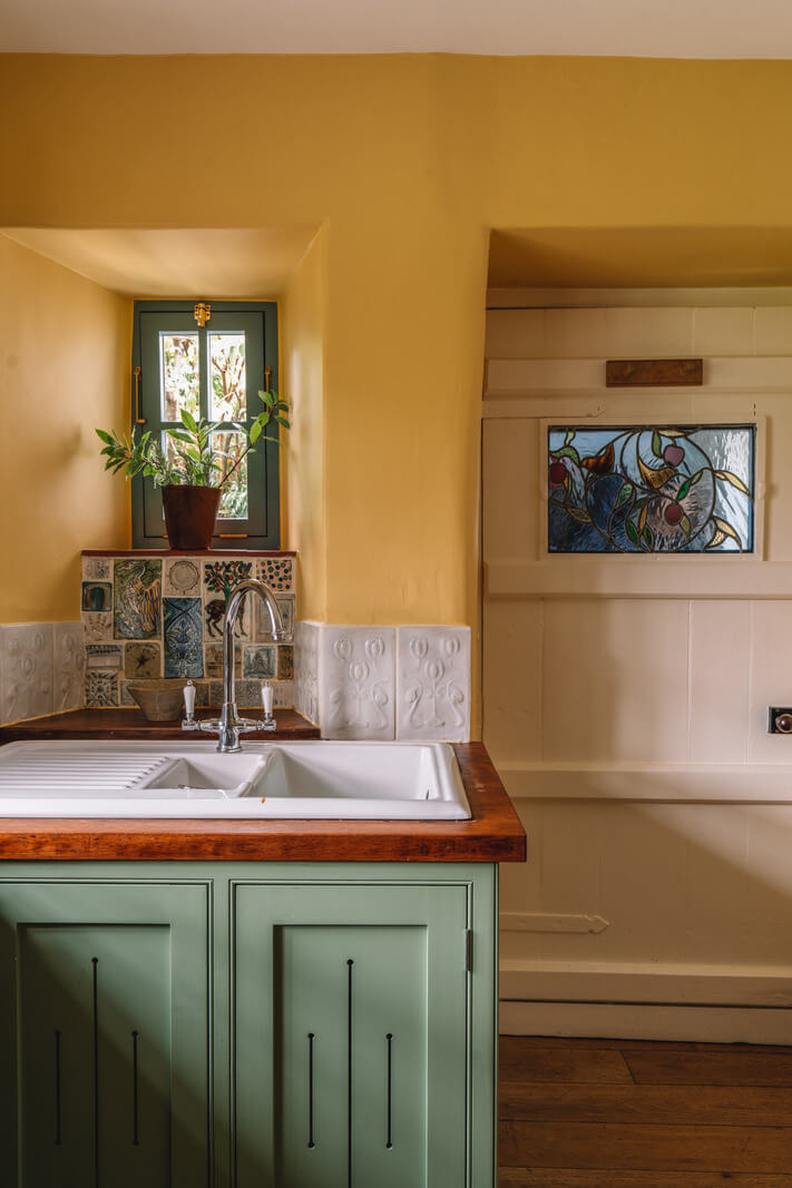 tiny window above kitchen sink