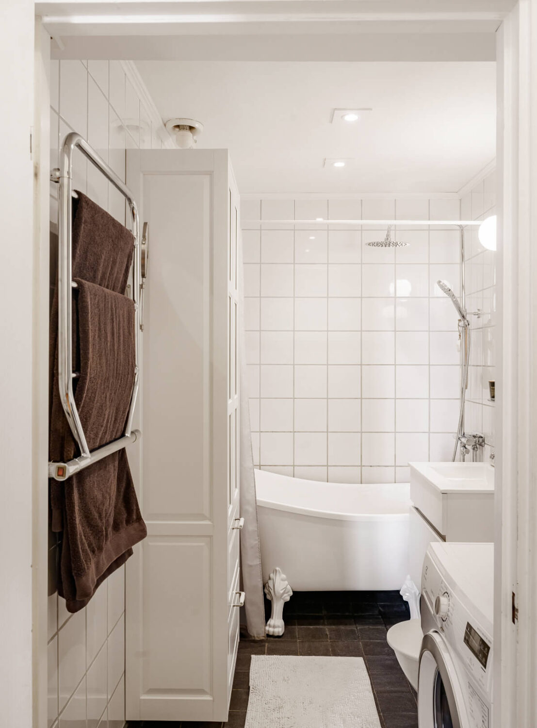 white bathroom 2 A Pink Living Room in a Light-Filled Stockholm Apartment