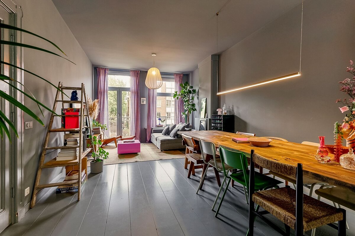 wooden dining table in gray living room