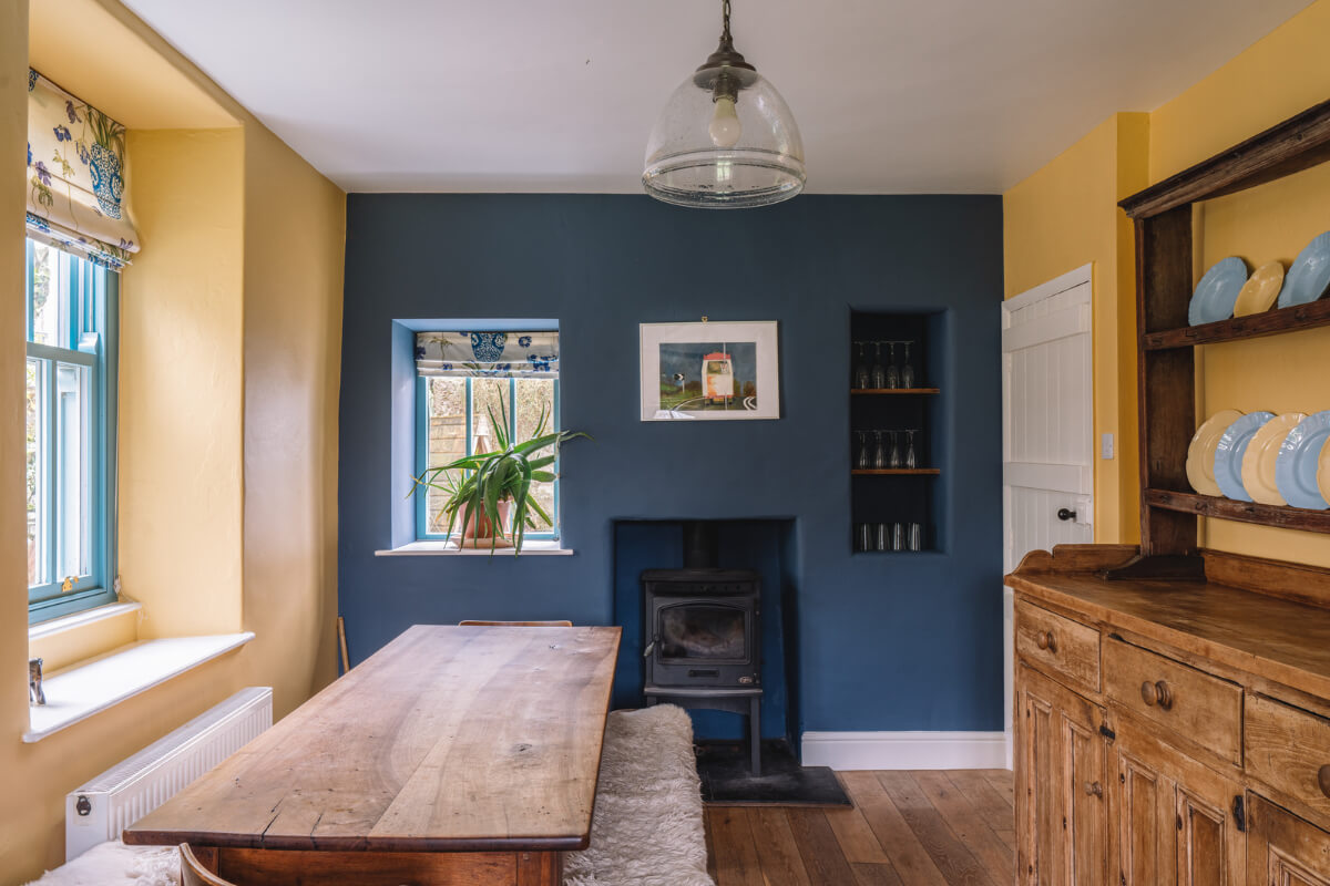 yellow and blue walls kitchen rustic table