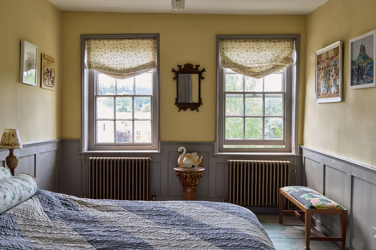 yellow bedroom gray paneling