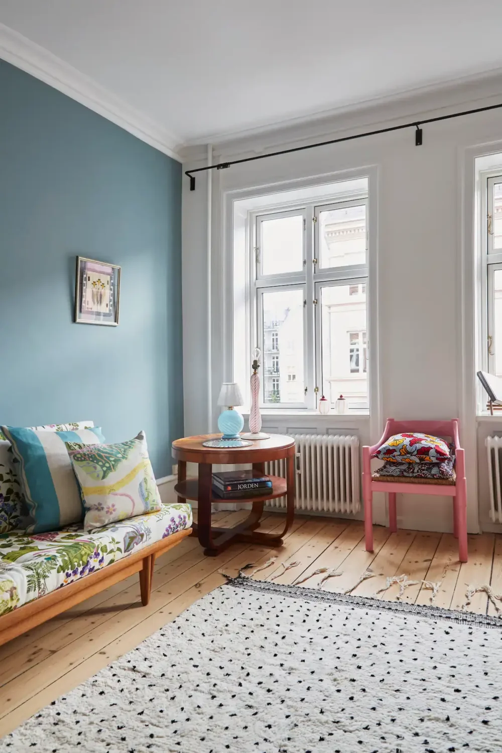living room with blue wall