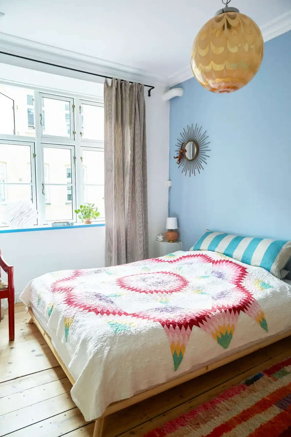 master bedroom with light blue wall