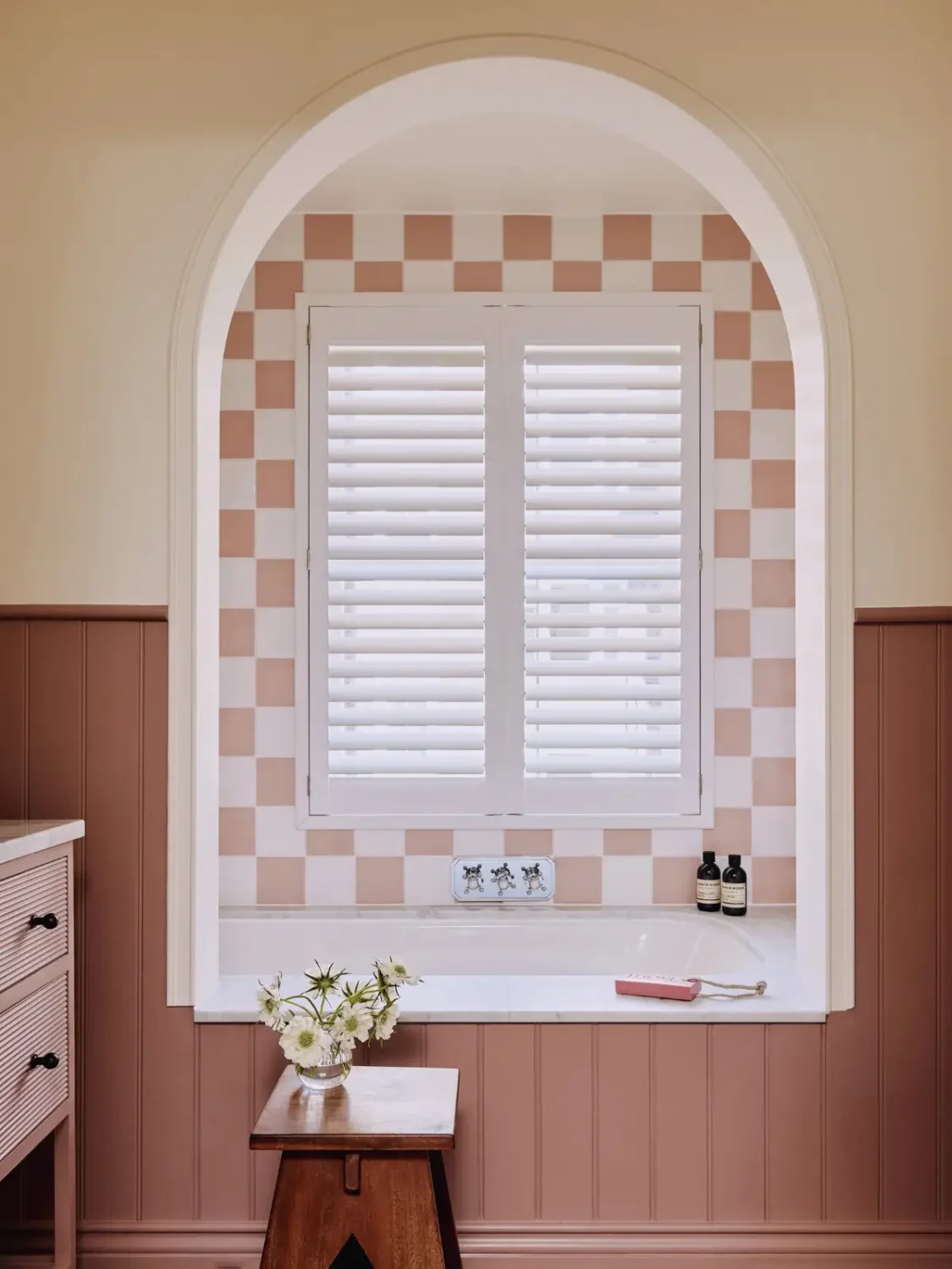 pink bathroom paneling arch bath
