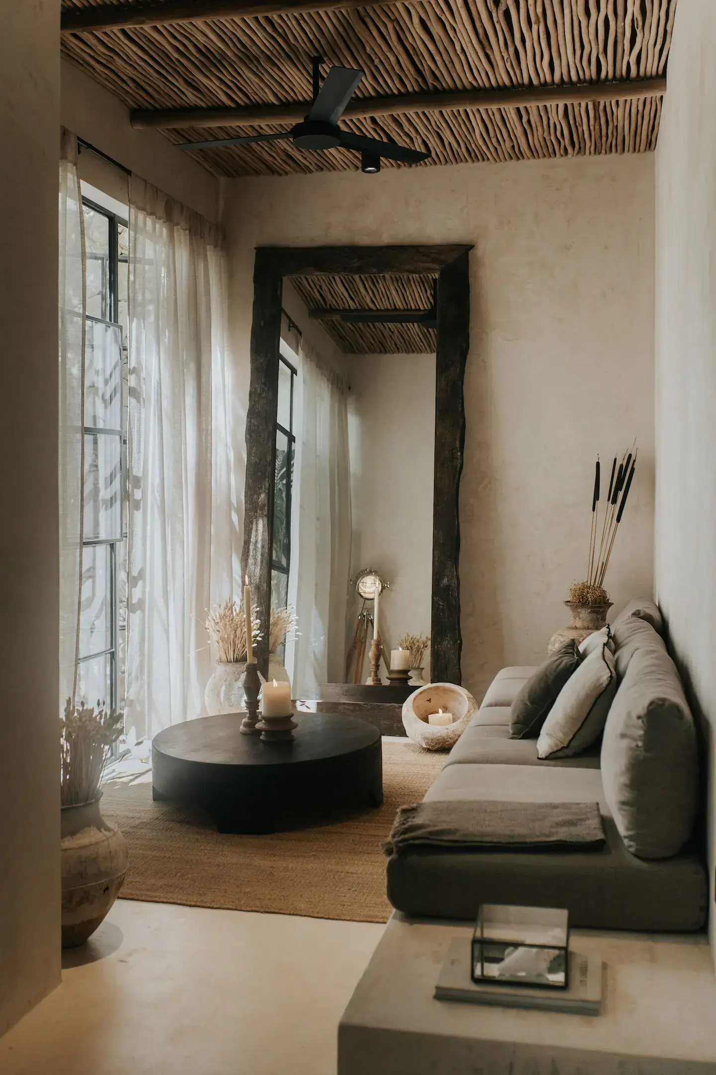 small-natural-living-room-large-wooden-mirror-wooden-stick-ceiling-nordroom